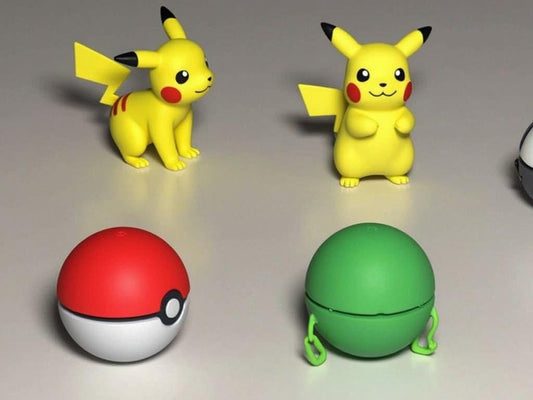 3D Printed Pokémon-themed desktop ornaments featuring Pokeballs